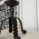 Brutalist iron candlestick Folk art
