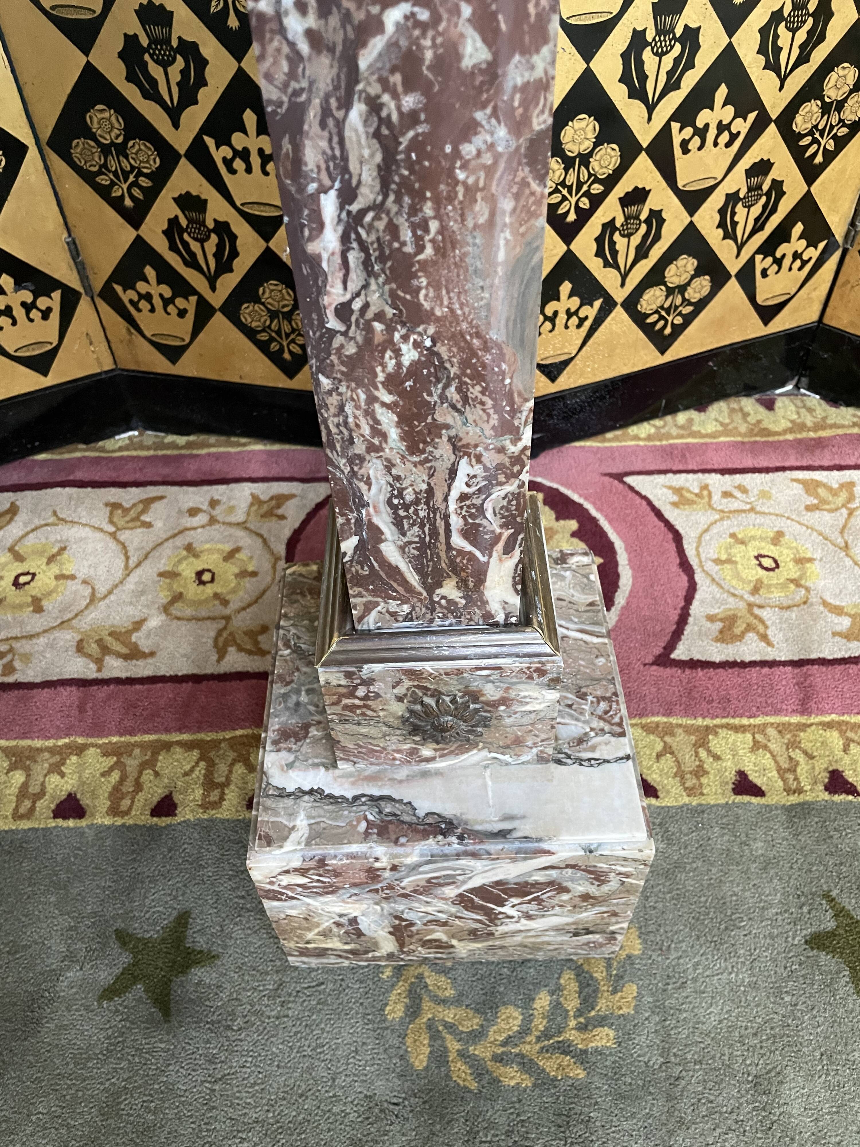 Marble and bronze sheathed selette