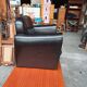 Mini black leather armchair for children