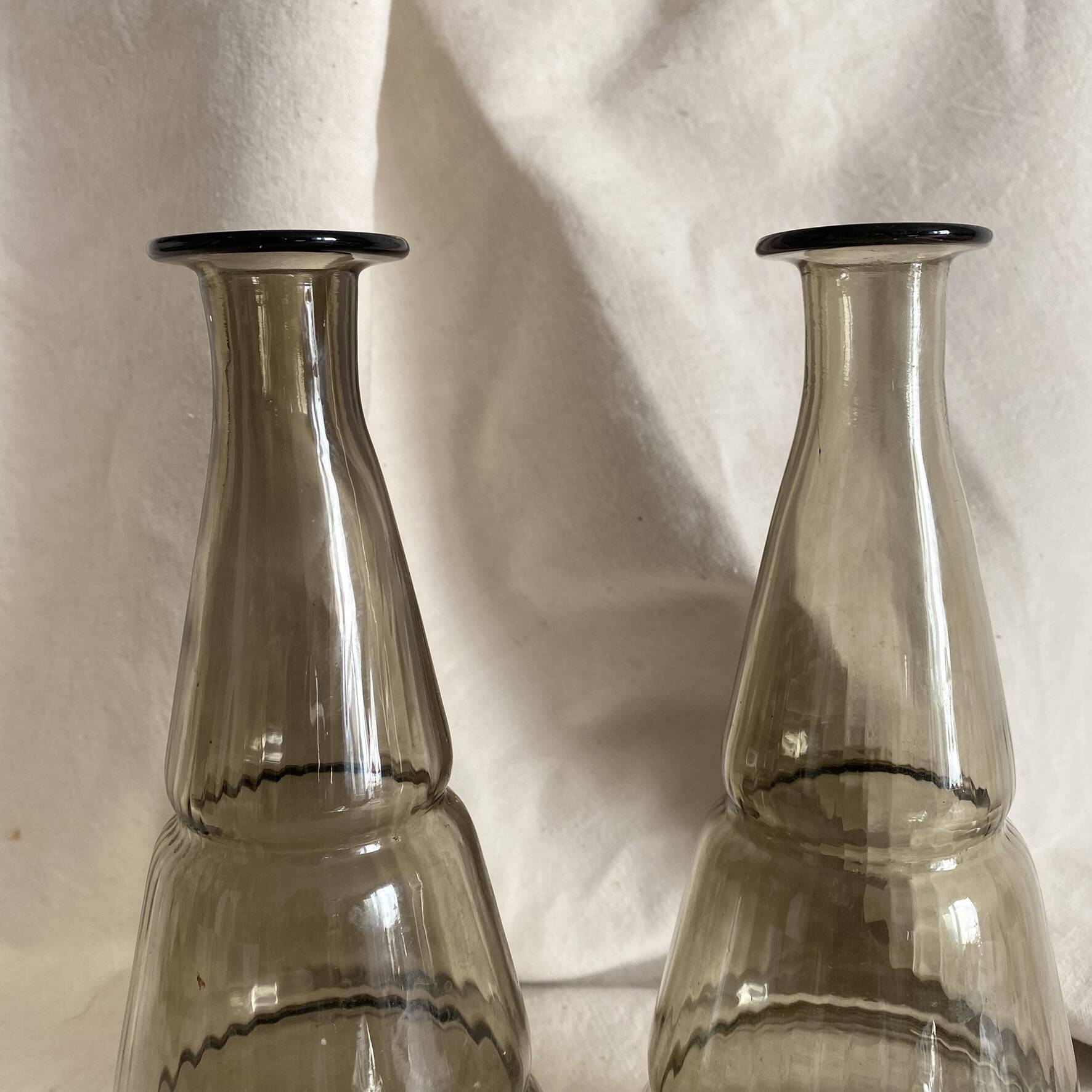 Pair of antique smoked glass vases carafes