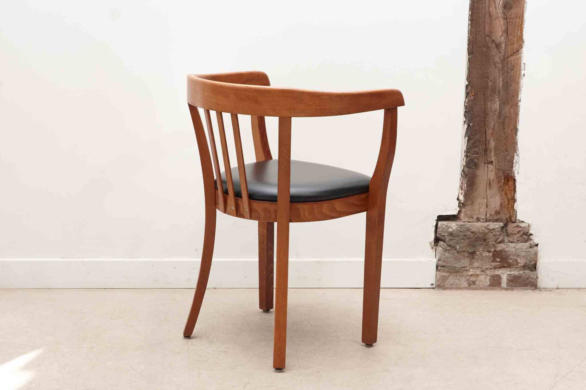 Stoelcker chair in black faux leather and oak