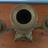 Bronze candlestick with lion head decoration