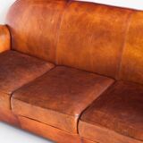 Vintage leather club sofa. Art Deco style. France, 1950s. (sofa convertible into bed)