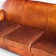 Vintage leather club sofa. Art Deco style. France, 1950s. (sofa convertible into bed)