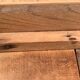Art Deco farmhouse table made of raw wood.