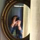 Golden Oval Mirror with Bow and Roses Decor