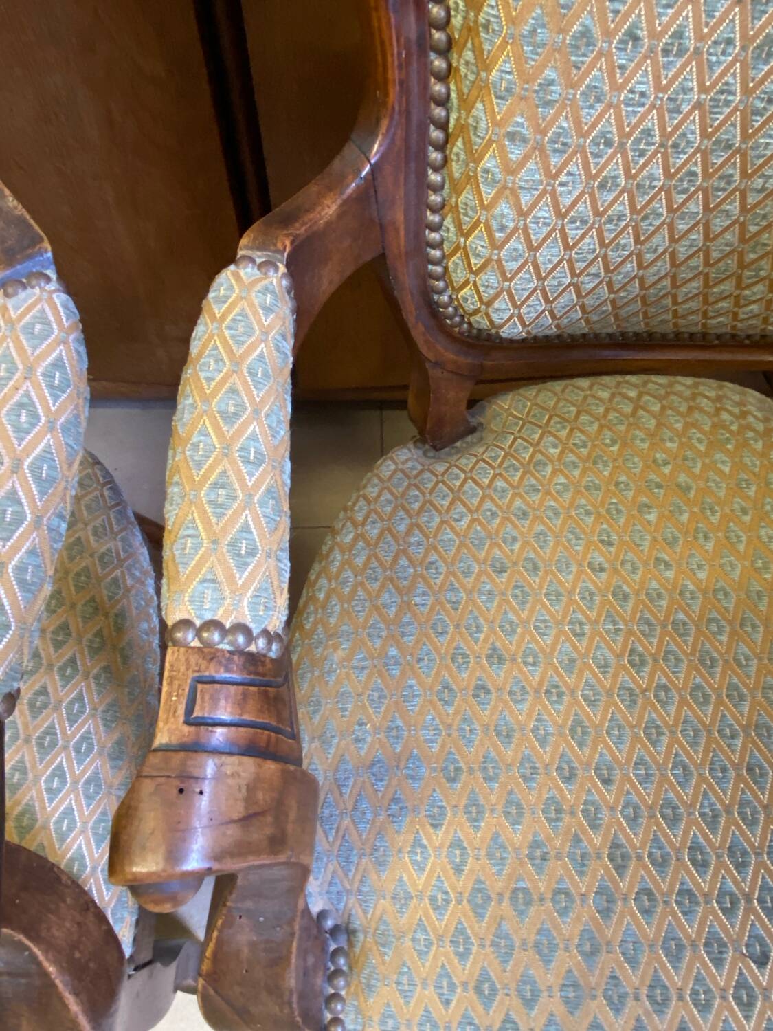 Two Louis XV style wooden and fabric armchairs