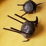 Zoomorphic wrought iron pocket emptier