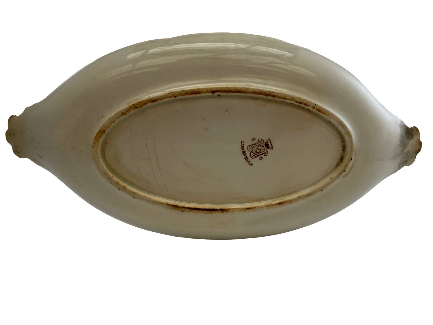 Gravy boat with its Luneville frame