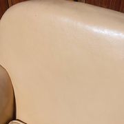 Pair of 1930s club armchairs in ivory leather.