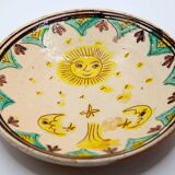 Handmade plate with moon and sun in Romania