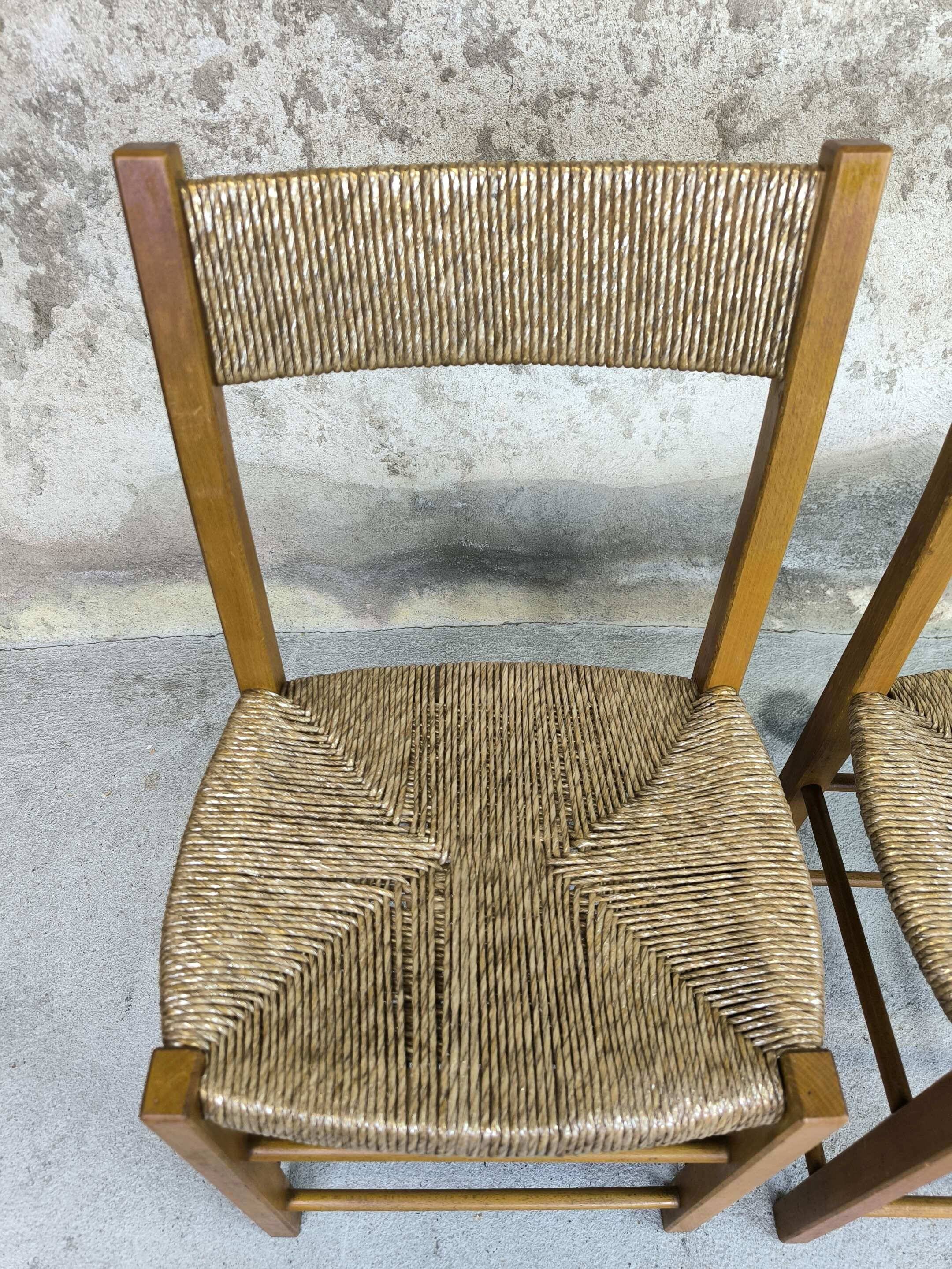 Pair of vintage wood and straw chairs