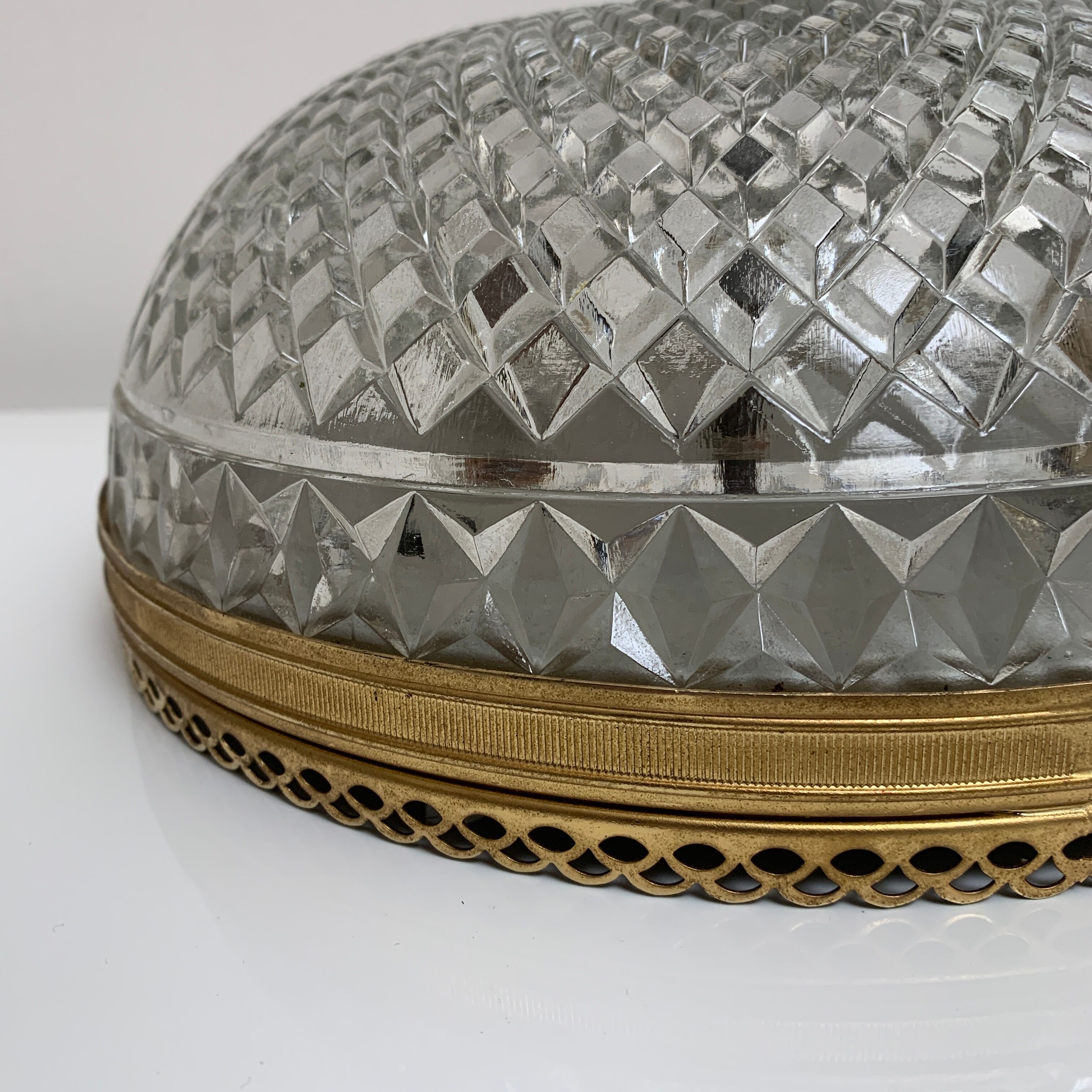 Ceiling lamp in molded glass and gilded metal