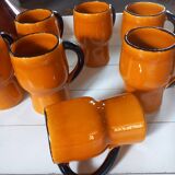 Old service 1 pitcher and 8 mugs/cups