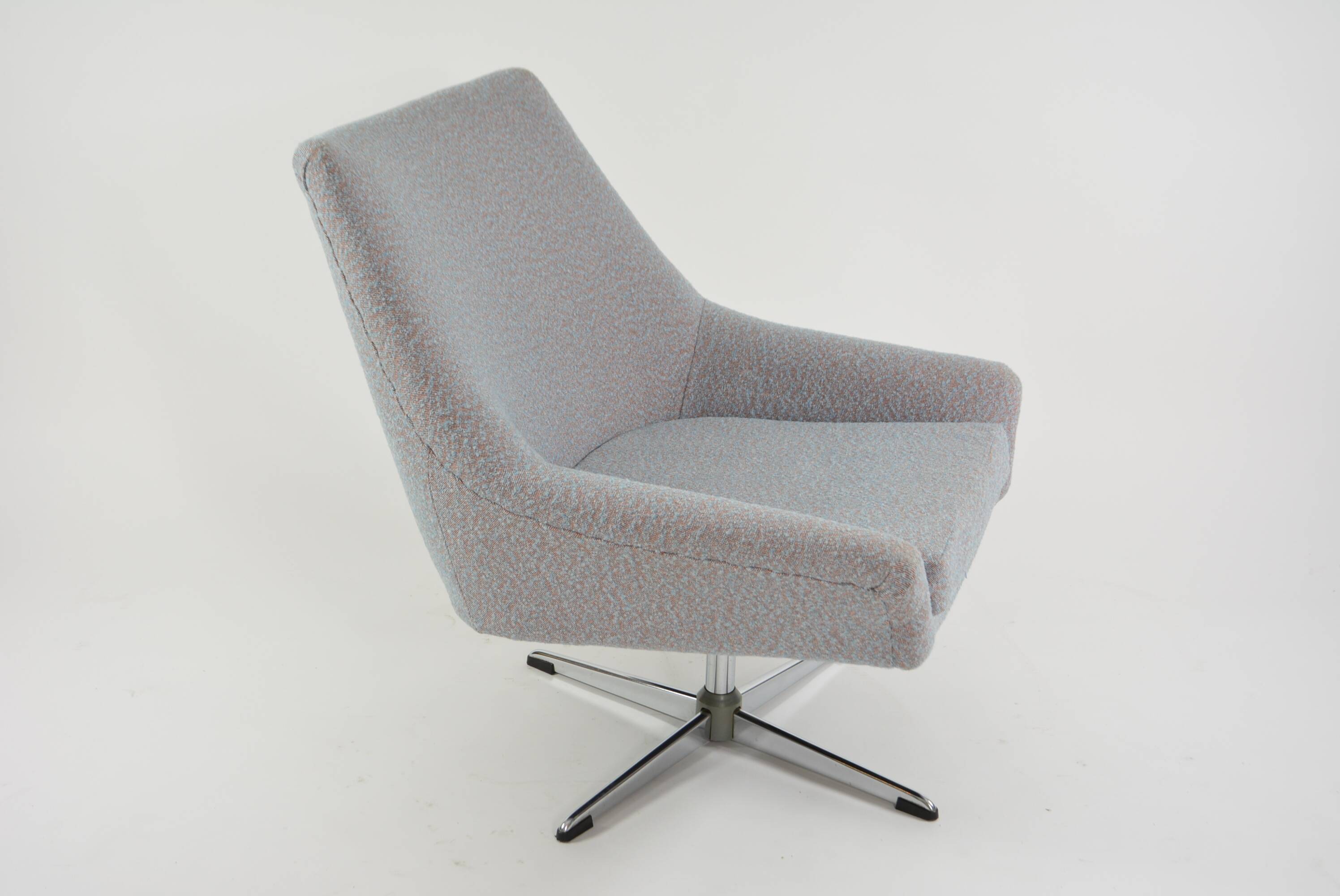 Modernist shell armchairs from the 1970s.