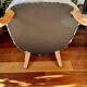 Pair of beige bouclette fabric frog chairs and their footrest.