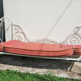Old wrought iron bed bench
