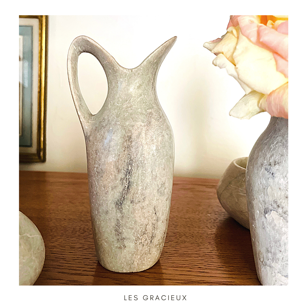 2 jugs in rough cut stone