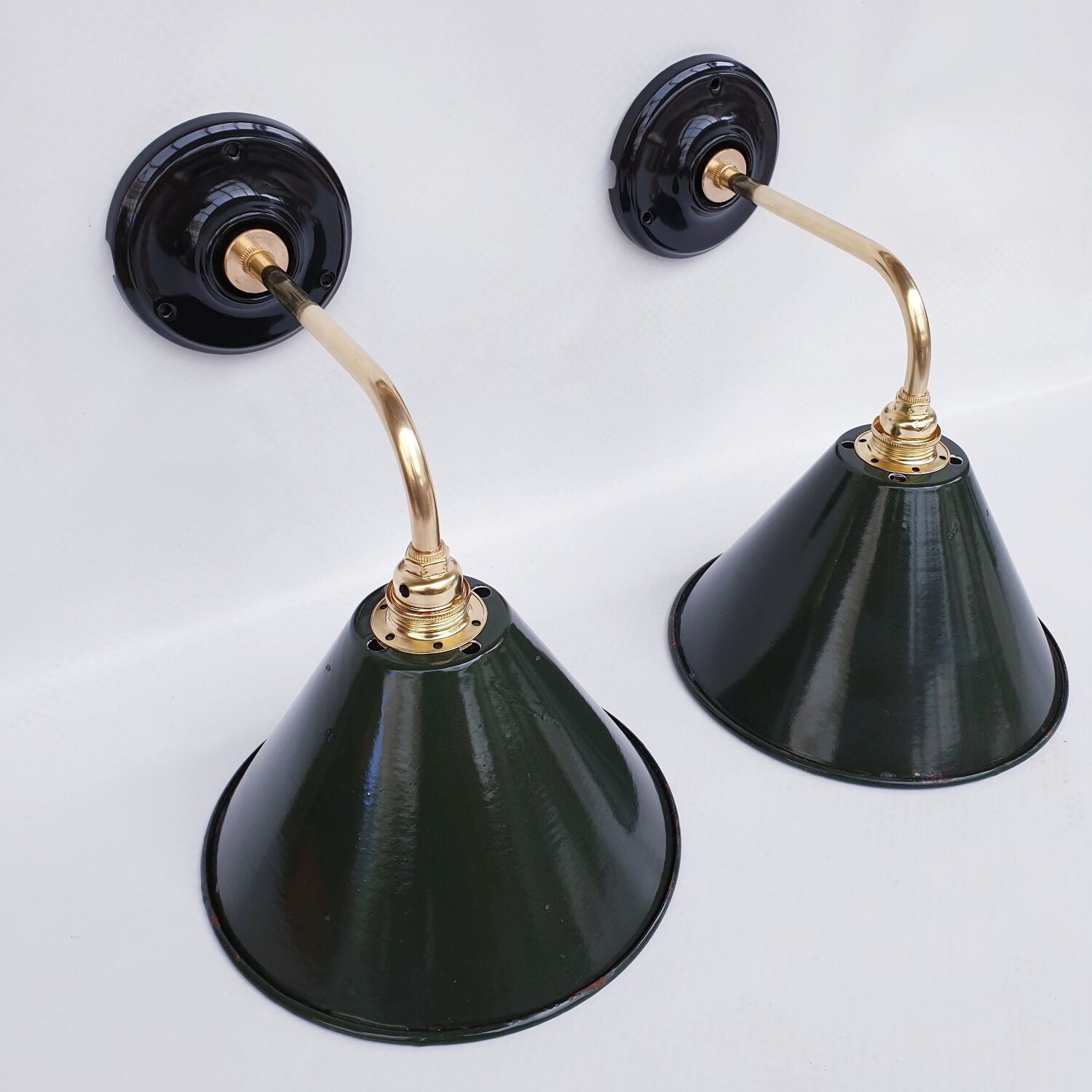 Pair of antique enamelled sheet metal wall lights