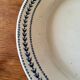 Old opaque porcelain plate gien terre de fer "laurels"