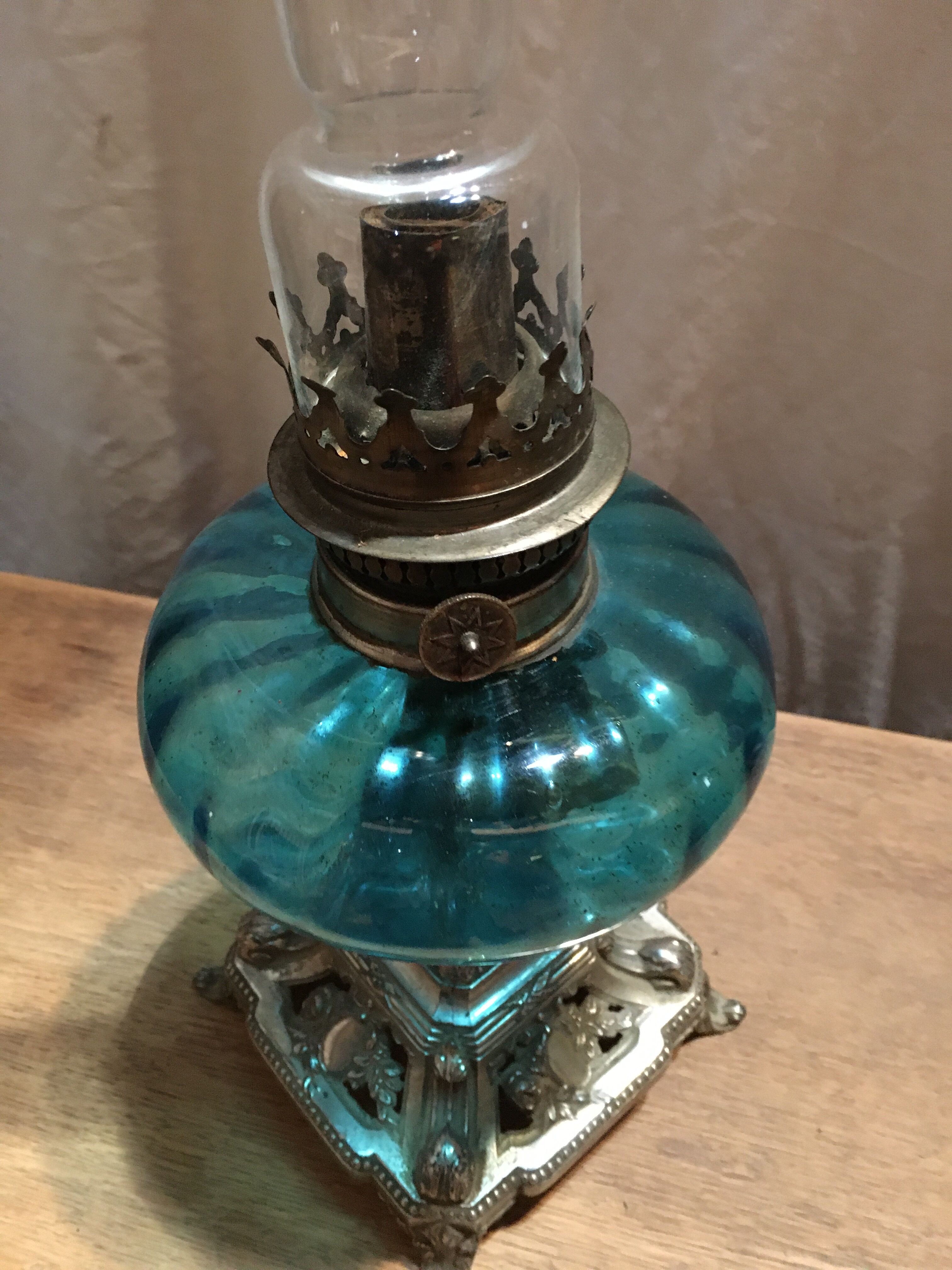 Blue oil lamp and metal foot