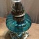 Blue oil lamp and metal foot