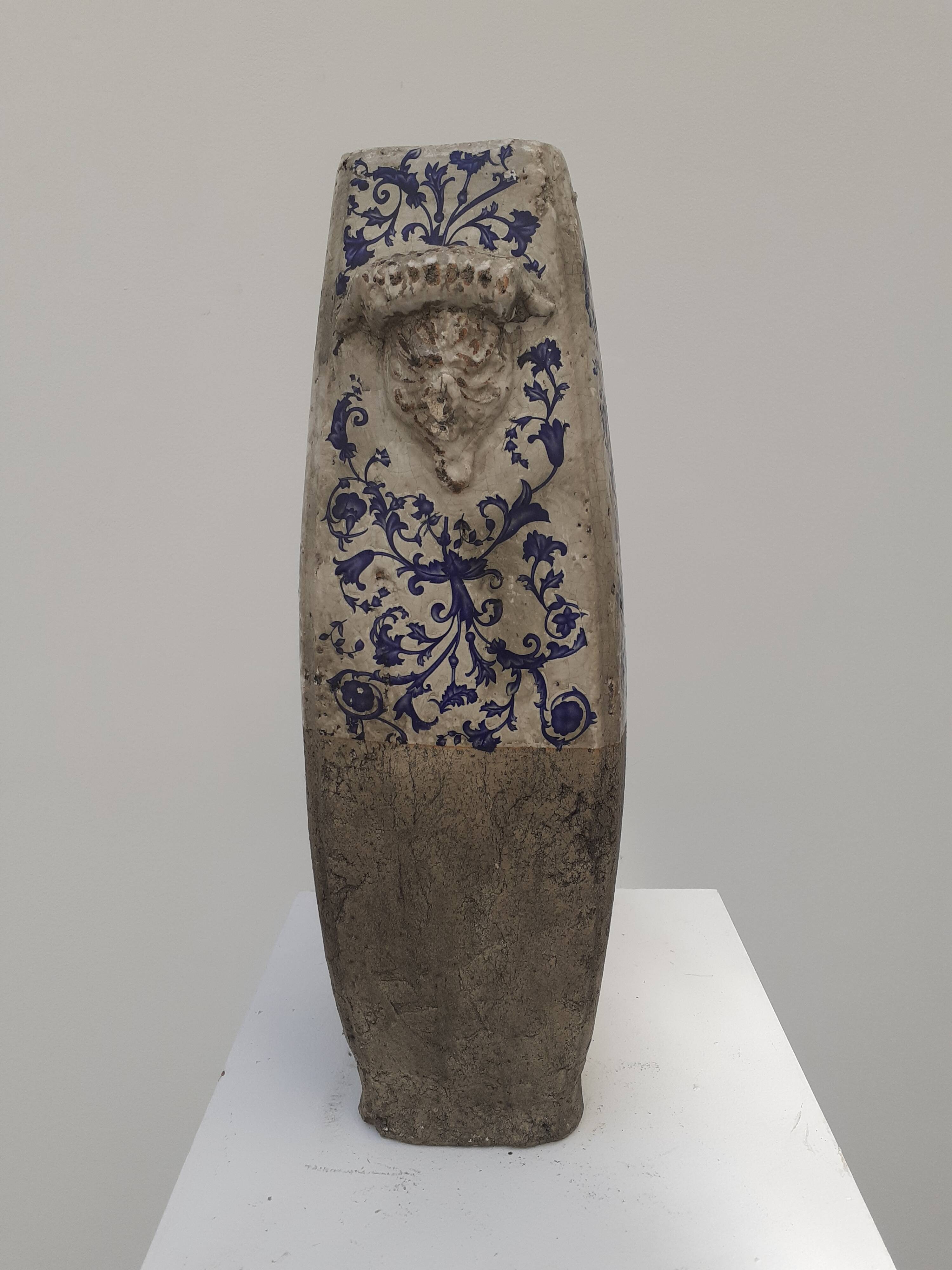Vase with blue and white enamel on terracotta