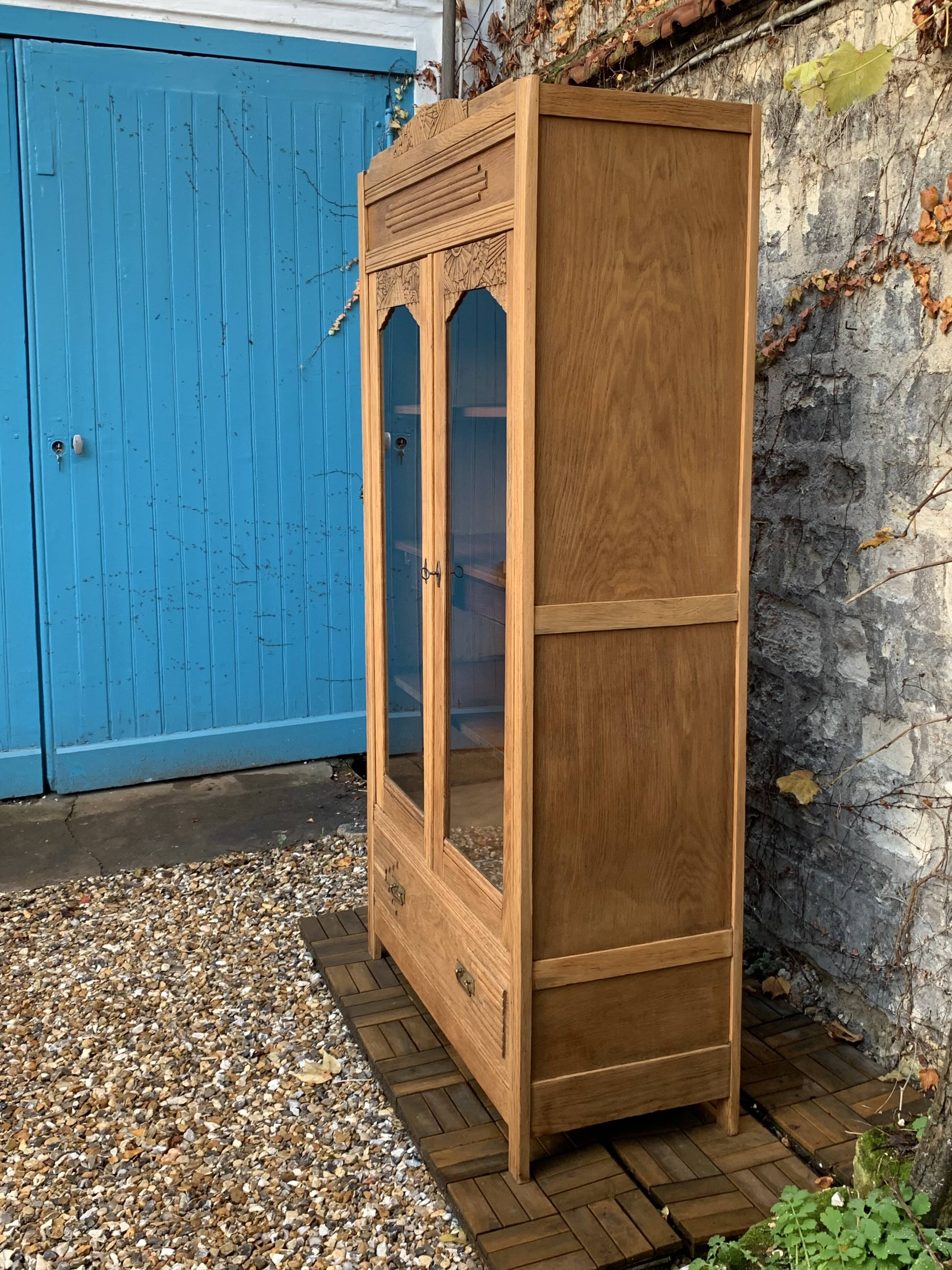 Parisian art deco glass cabinet in raw wood
