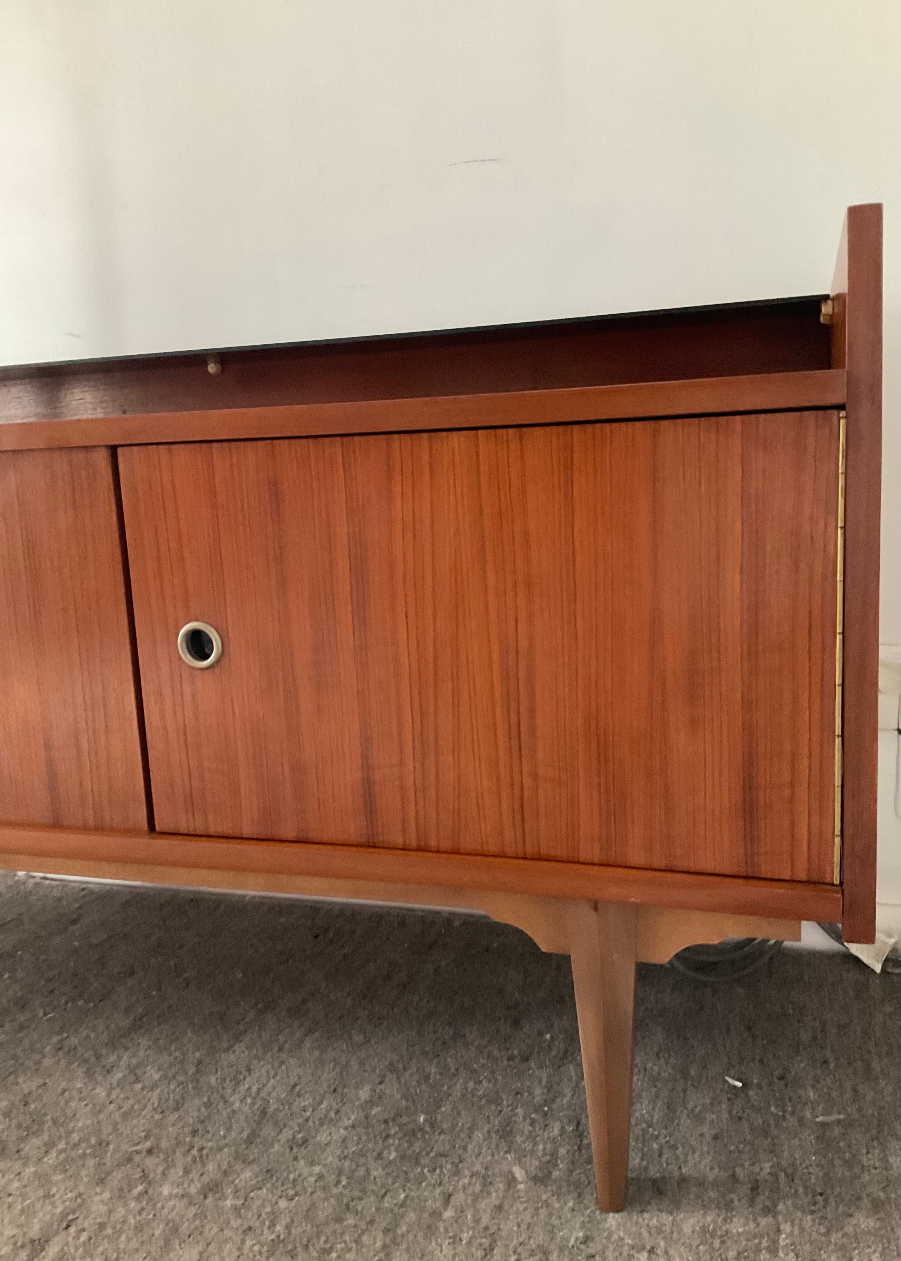 Scandinavian teak row from the 60s