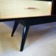 Row formica feet compass of the 1960s
