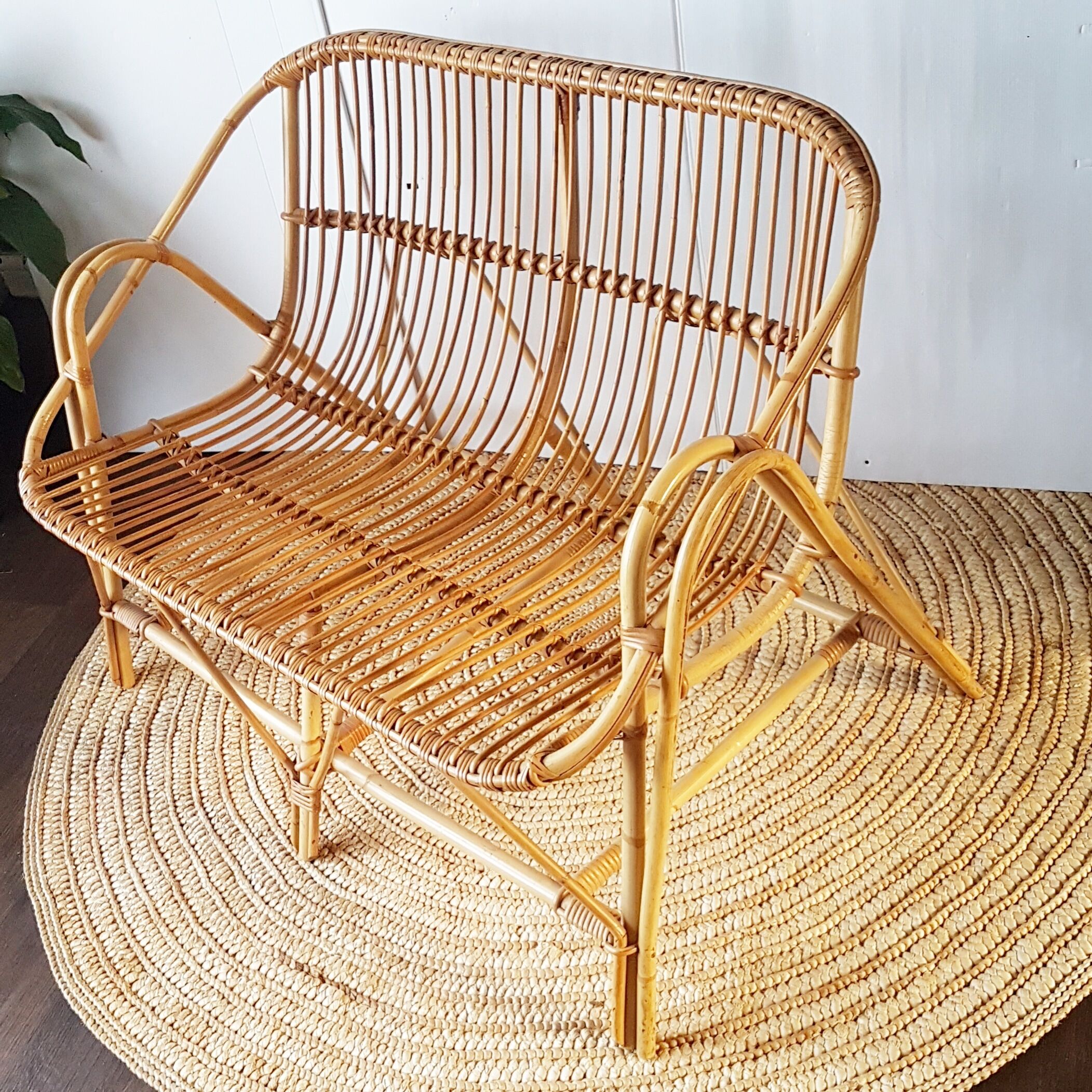 Bench into rattan 2 seater of the sixties