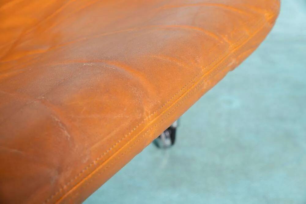 60s cognac leather designer armchair, mid-century modern leather lounge chair.