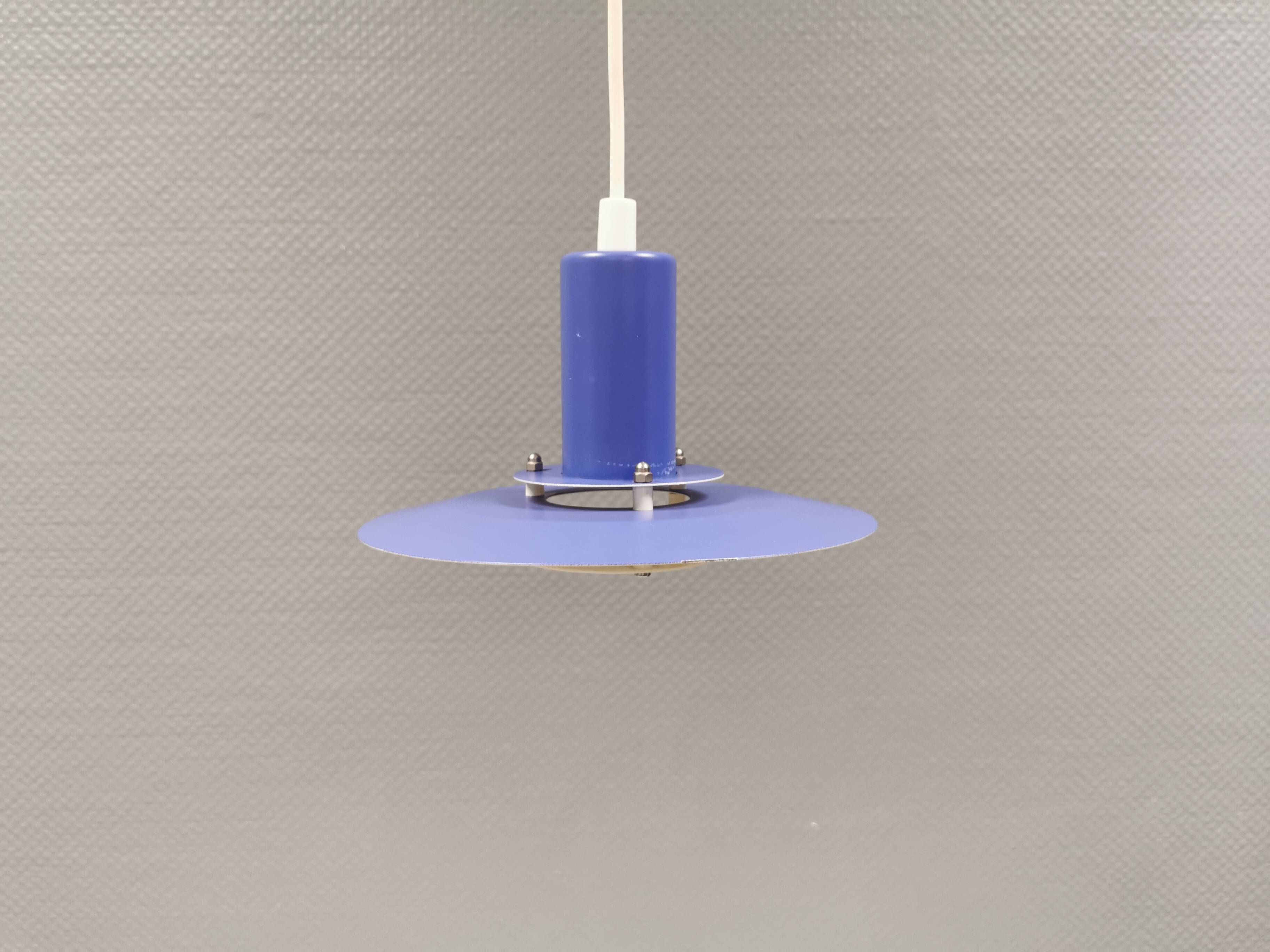 A blue minimalist hanging lamp from Lyfa Denmark 1980s.