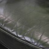 Smooth classic cowhide Chesterfield armchair in a stylish dark green color