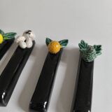 Set of 8 barbotine knife holders