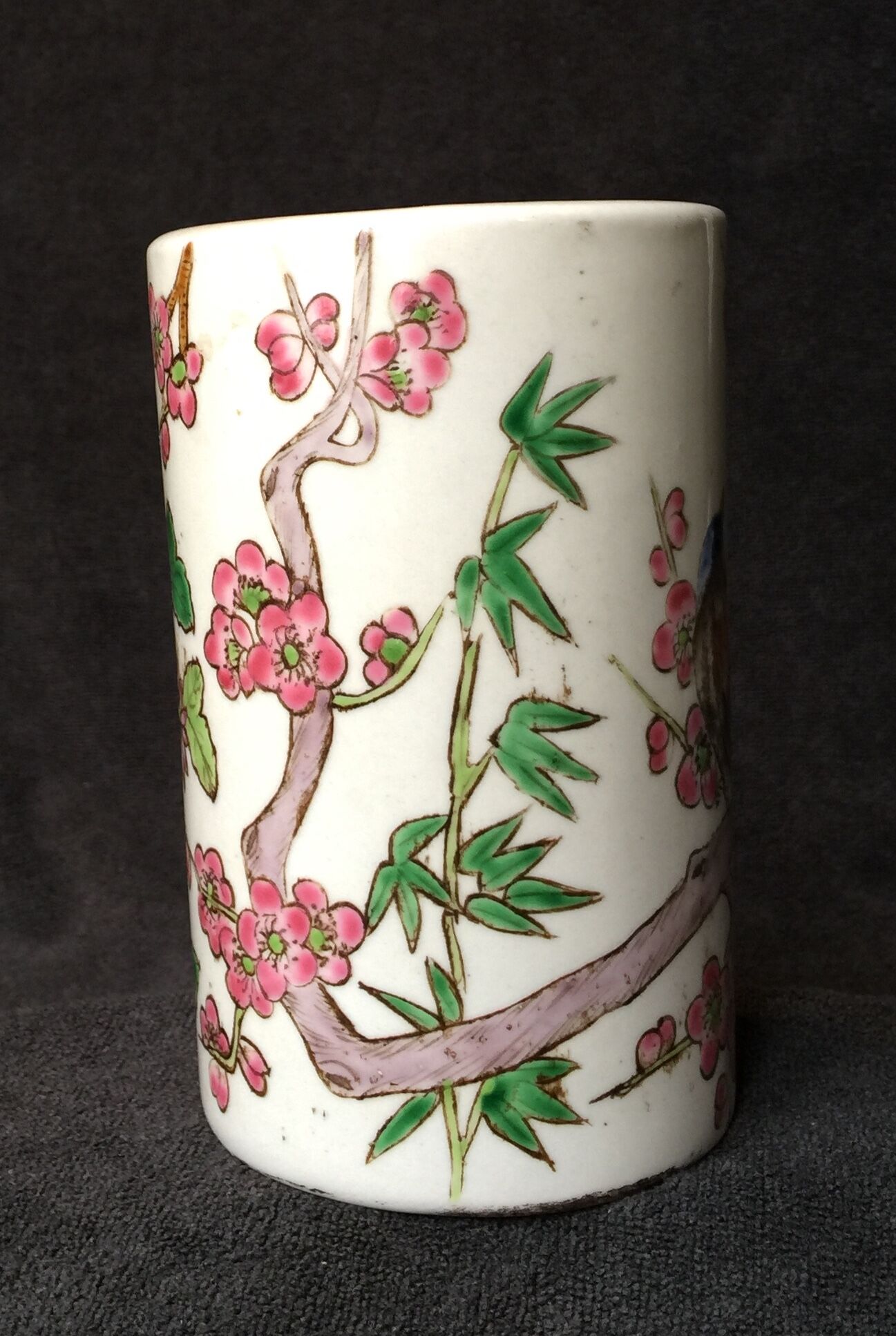Small vase roll decoration birds branches of cherry blossoms and flowers