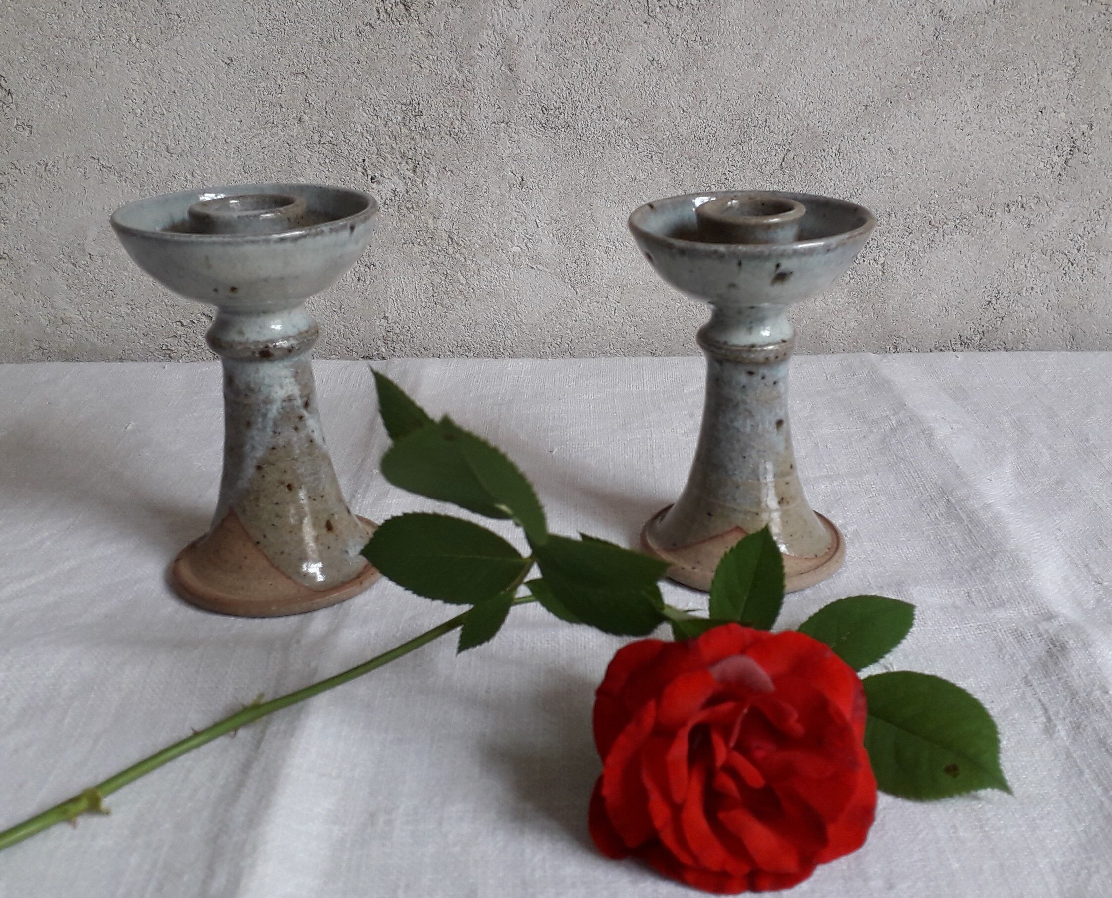 Pair of sandstone candlesticks