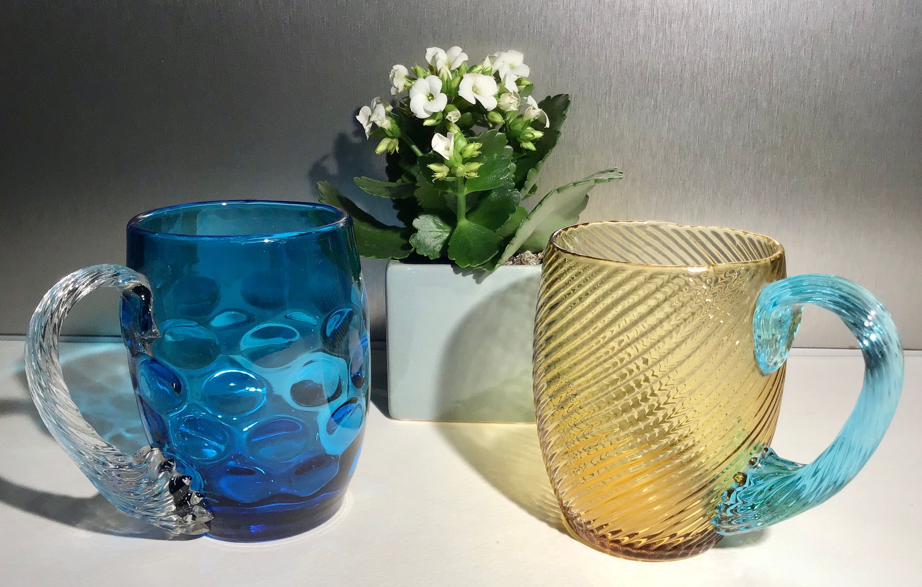 Two glass and crystal mugs, model of the Portieux crystal factory.