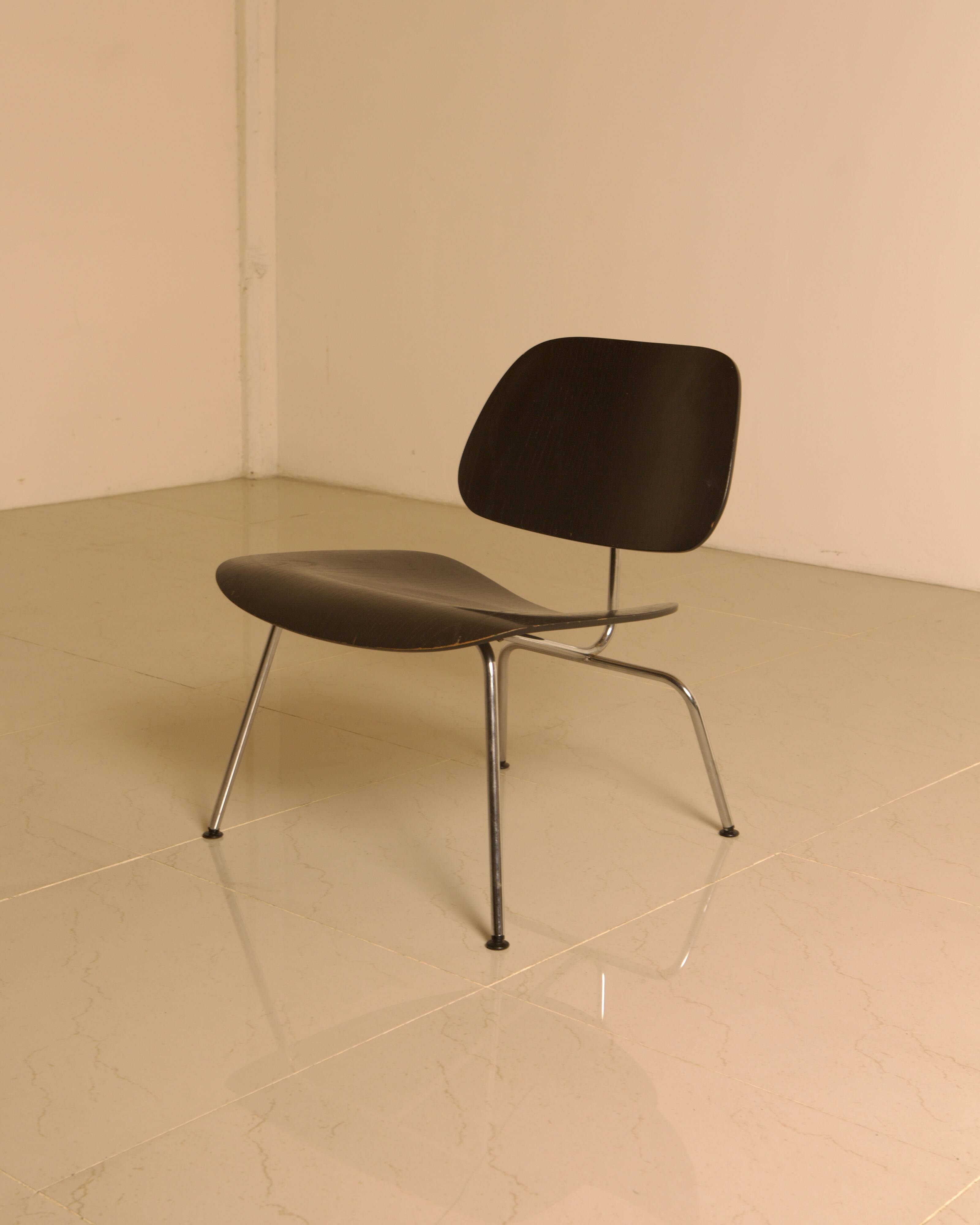 "LCM" chairs in black ash by Charles and Ray Eames for Herman Miller 60s.