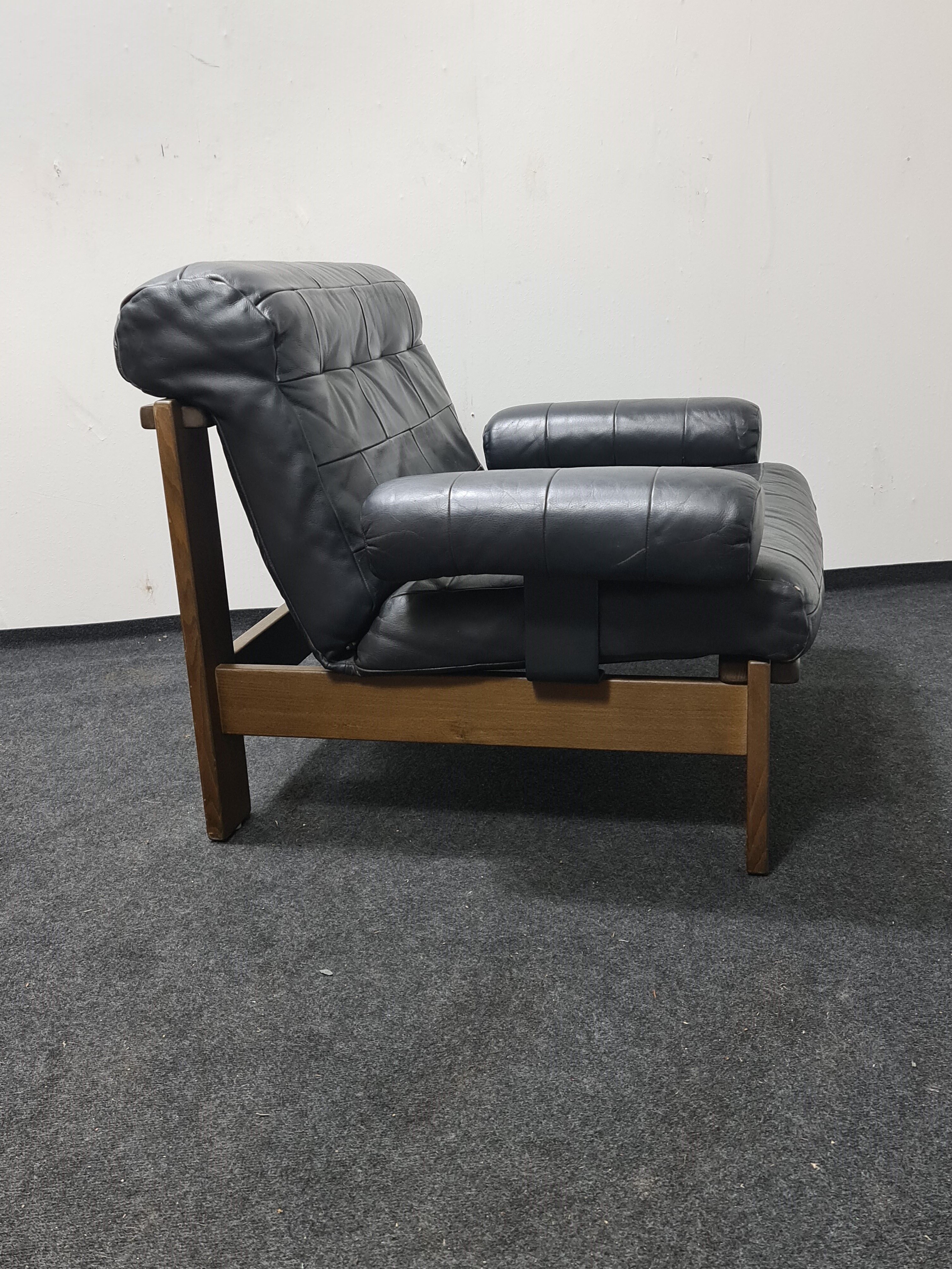 Vintage black leather patchwork and oak lounge chair