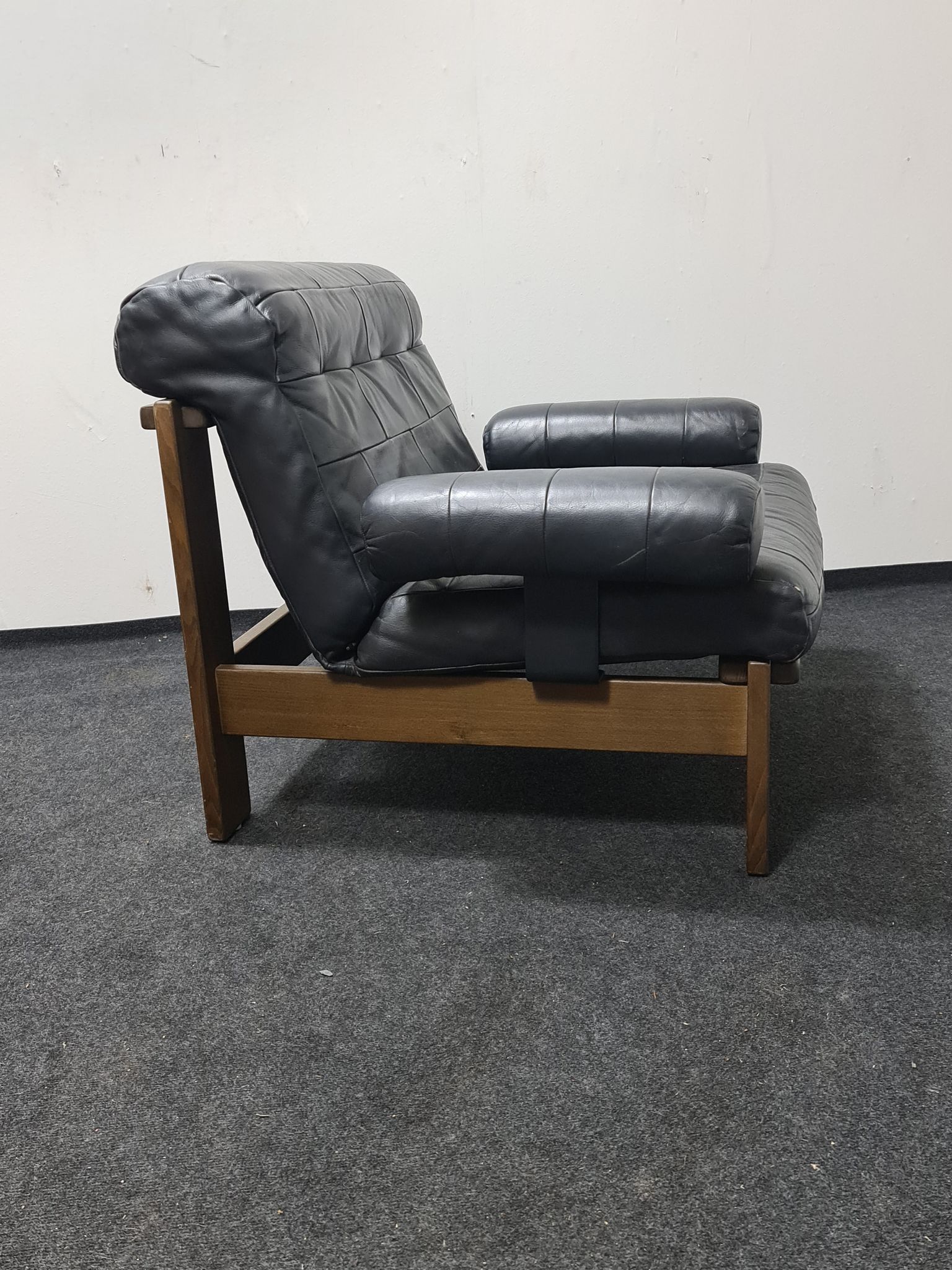 Vintage black leather patchwork and oak lounge chair