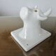 Stylized cow head in white ceramic, wall decoration from the 80s