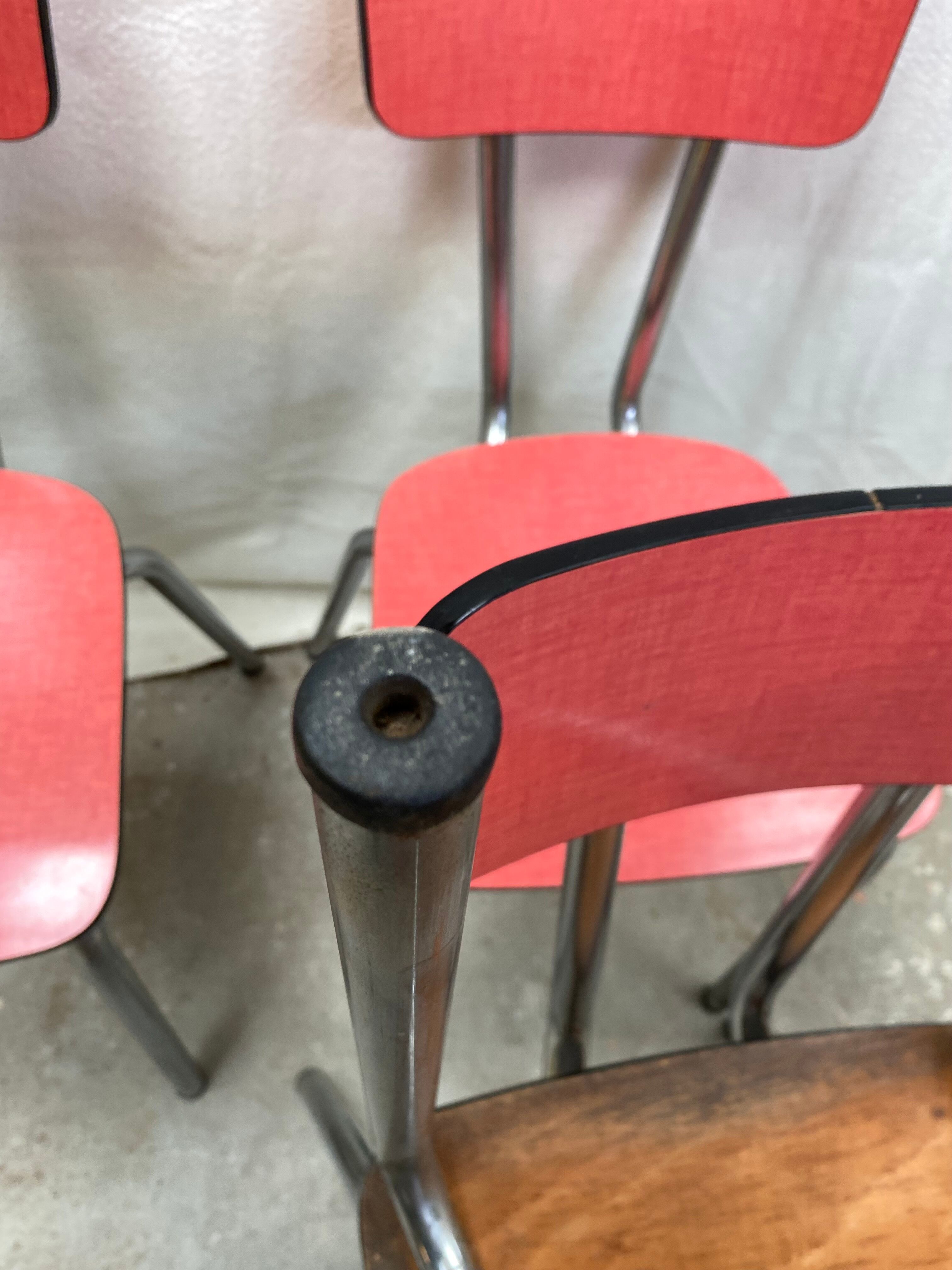 Suite of 4 red formica chairs