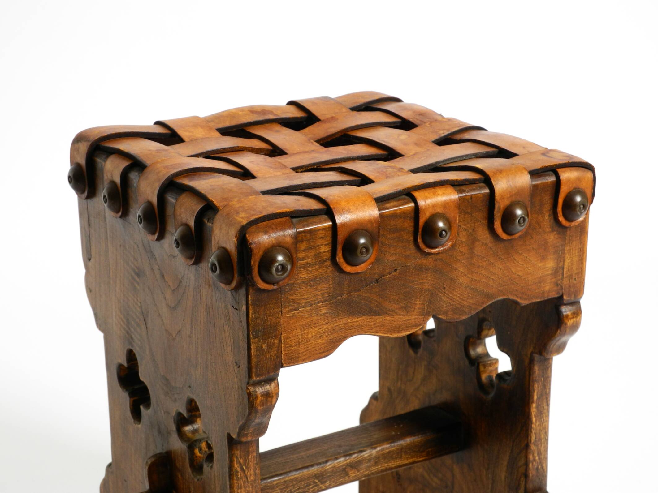 Beautiful 1940s oak stool with a seat made of leather straps