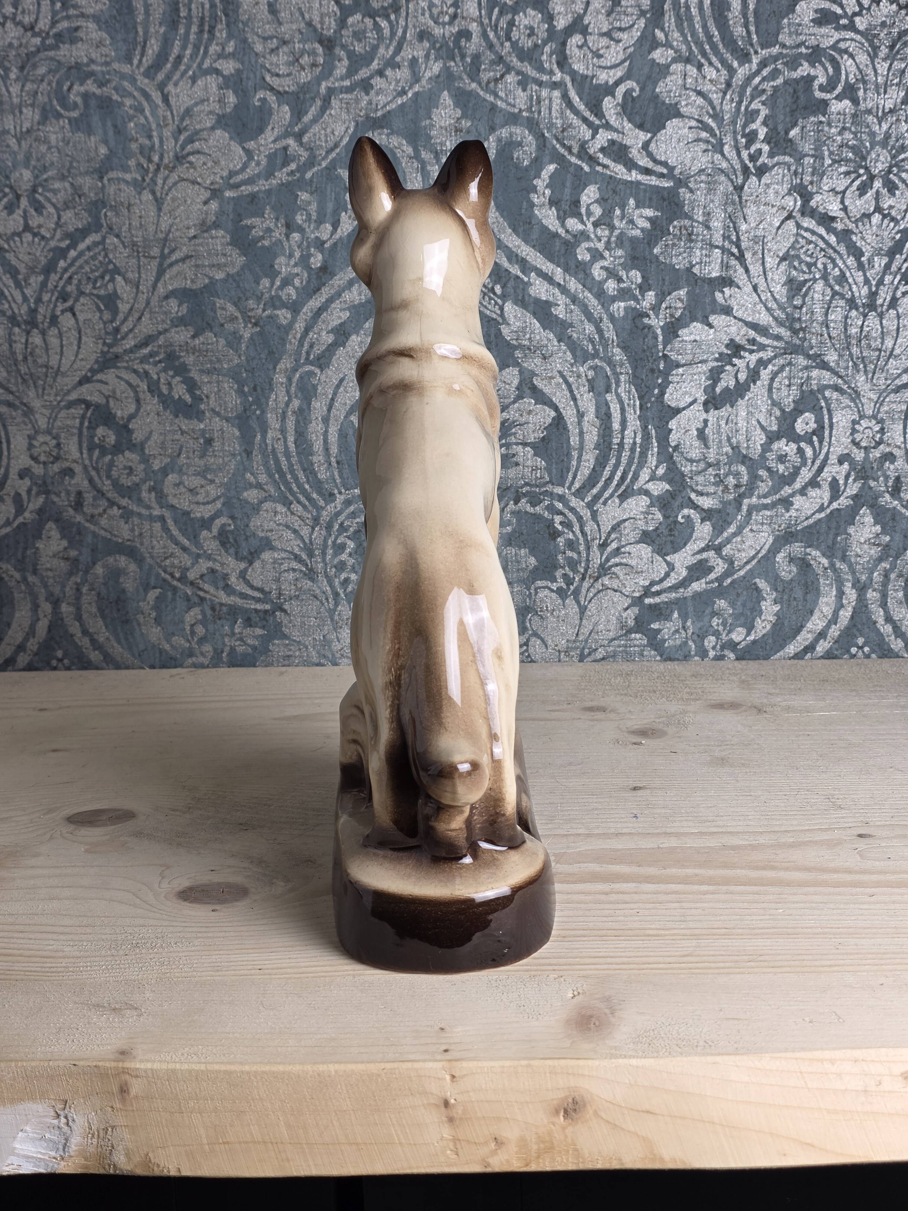 Porcelain shepherd dog, large decorative sculpture.