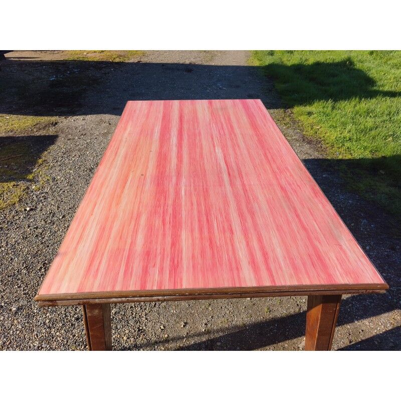 1960s oak dining table with integrated extensions.