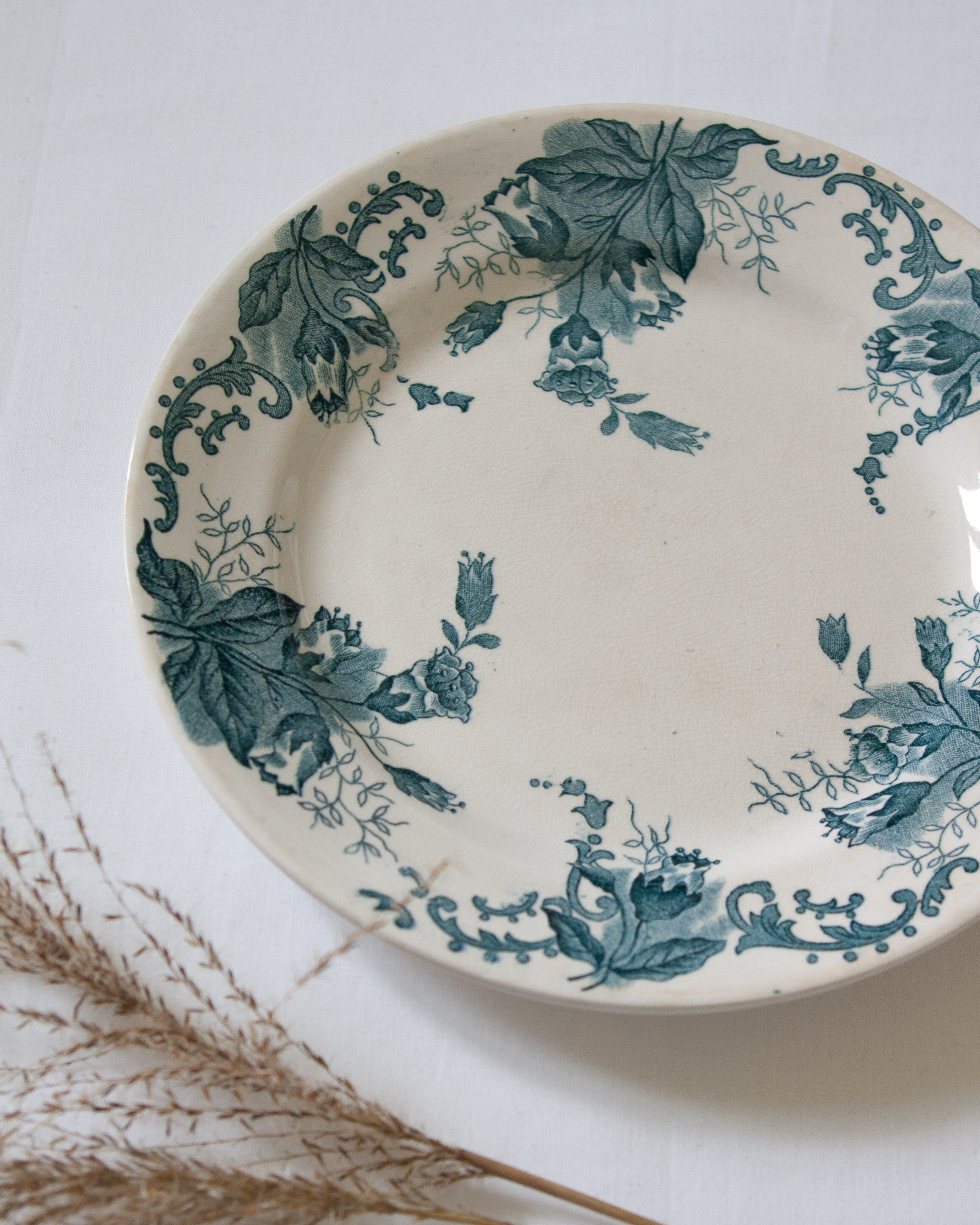 Pair of old flowered plates