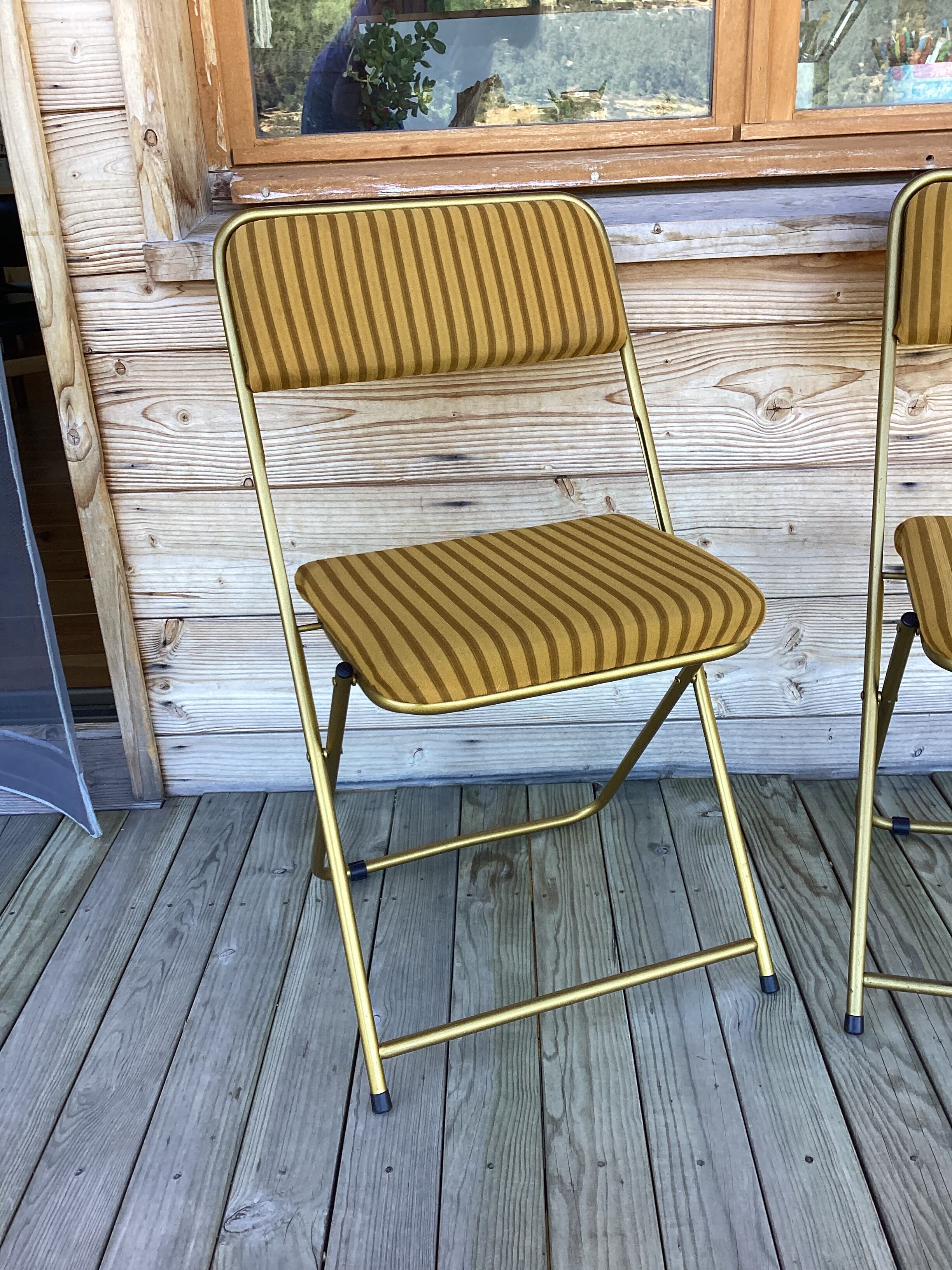 Vintage lafuma folding chair with striped gold fabric