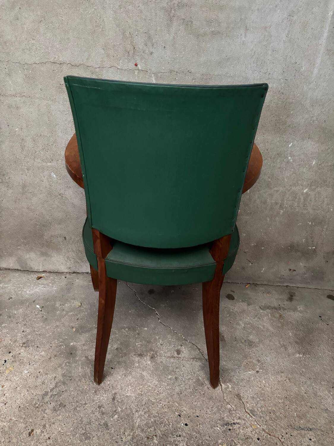 Green faux leather bridge chair