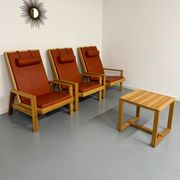Scandinavian design lounge set in pine with 3 lounge chairs and a table from the 70s.